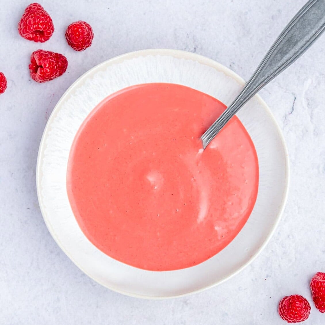 raspberry Vinaigrette dressing in a small bowl.