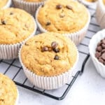 Baked muffins over a wire rack.