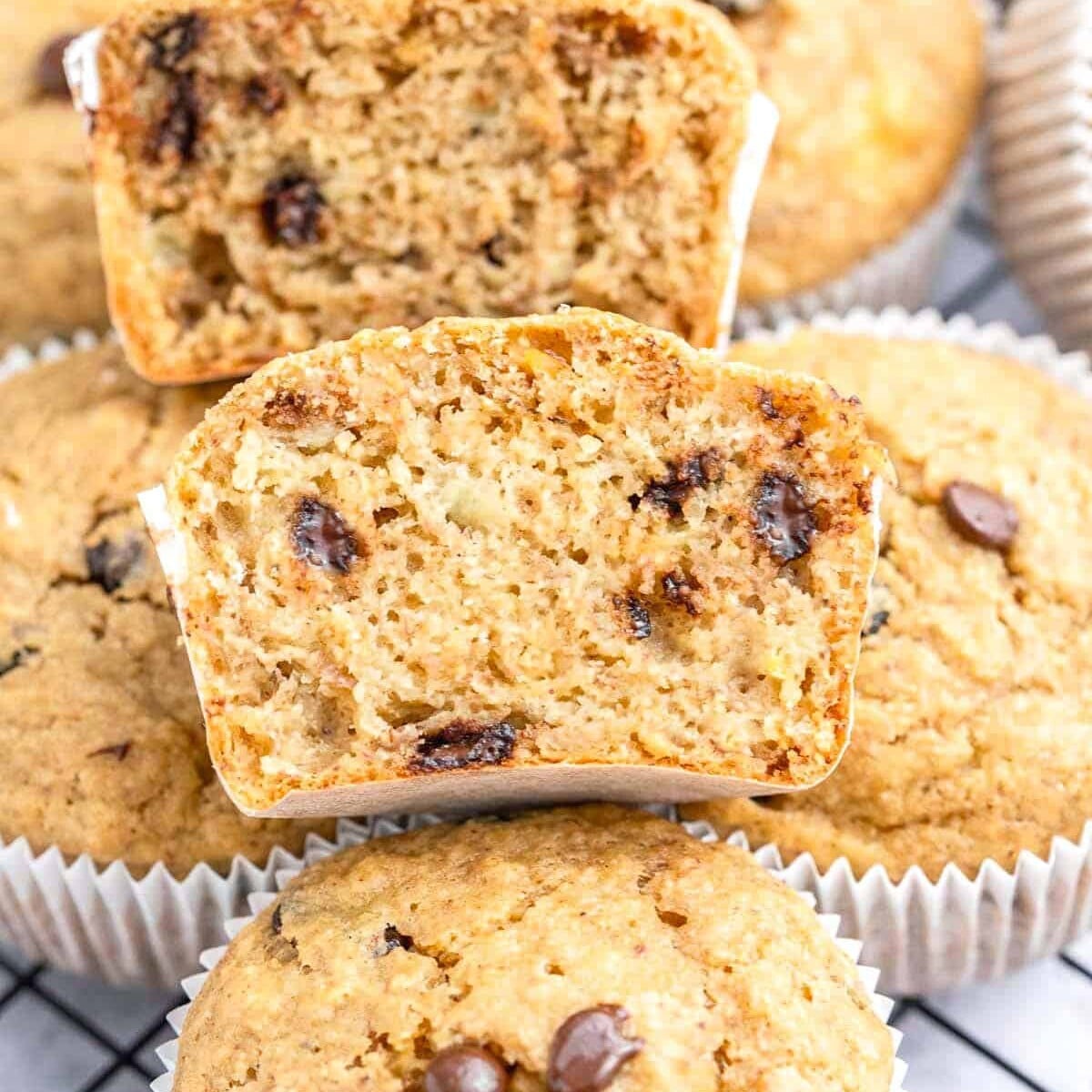 Baked muffin sliced in half to show the inside.