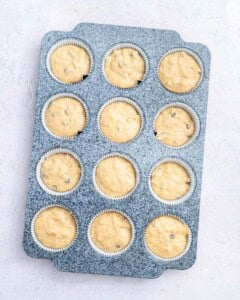 Batter added to the muffin tin pan.