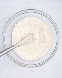 flour and dry ingredients mixed in a bowl.