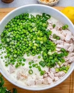 added the green peas onto the shredded chicken mixture.