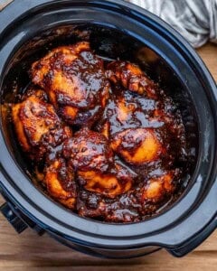 cooked chicken thighs in the slow cooker.