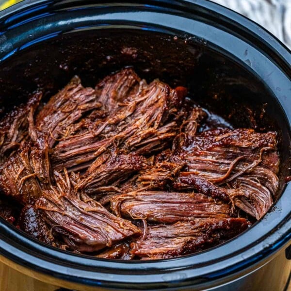 slow cooked chuck roast shredded in a crockpot.