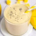 Chia seed mango smoothie in a cup.