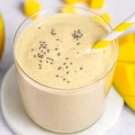 Chia seed mango smoothie in a cup.