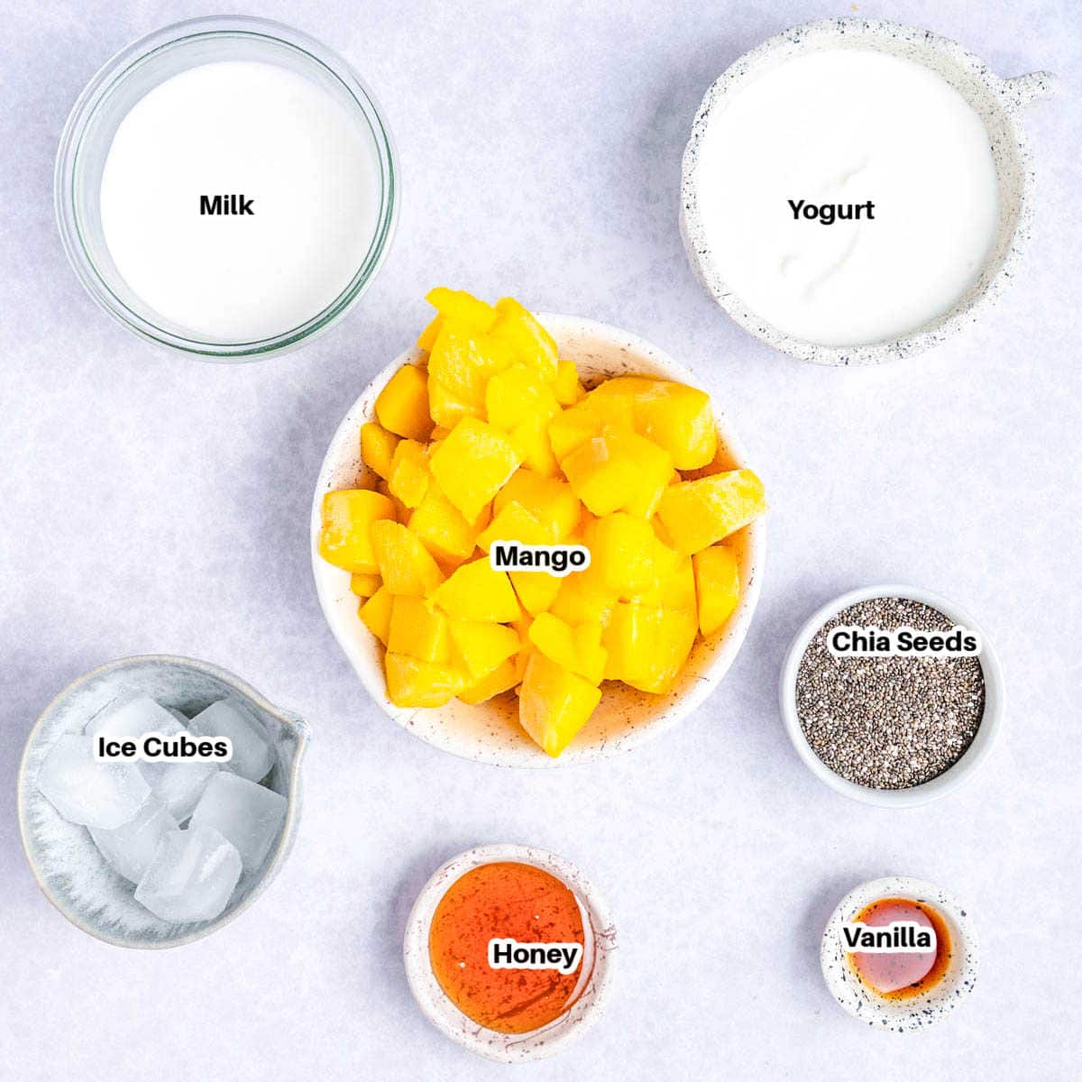Mango chia smoothie ingredients laid out.