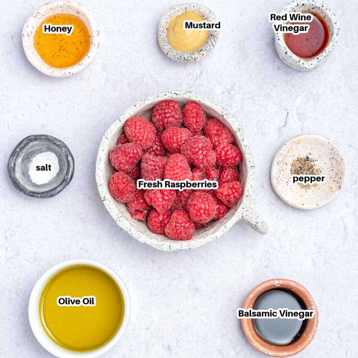 Ingredients to make raspberry vinaigrette dressing