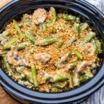 slow cooked green bean casserole in a slow cooker.