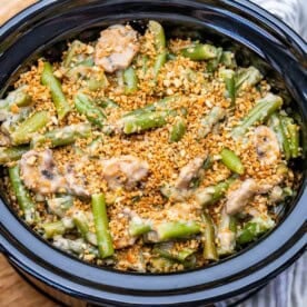 slow cooked green bean casserole in a slow cooker.