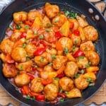 Sweet and sour meatballs in a pan.