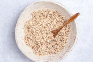 Making streusel for muffins in a bowl.