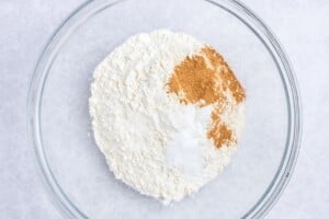mixing the dry flour ingredients for muffins.