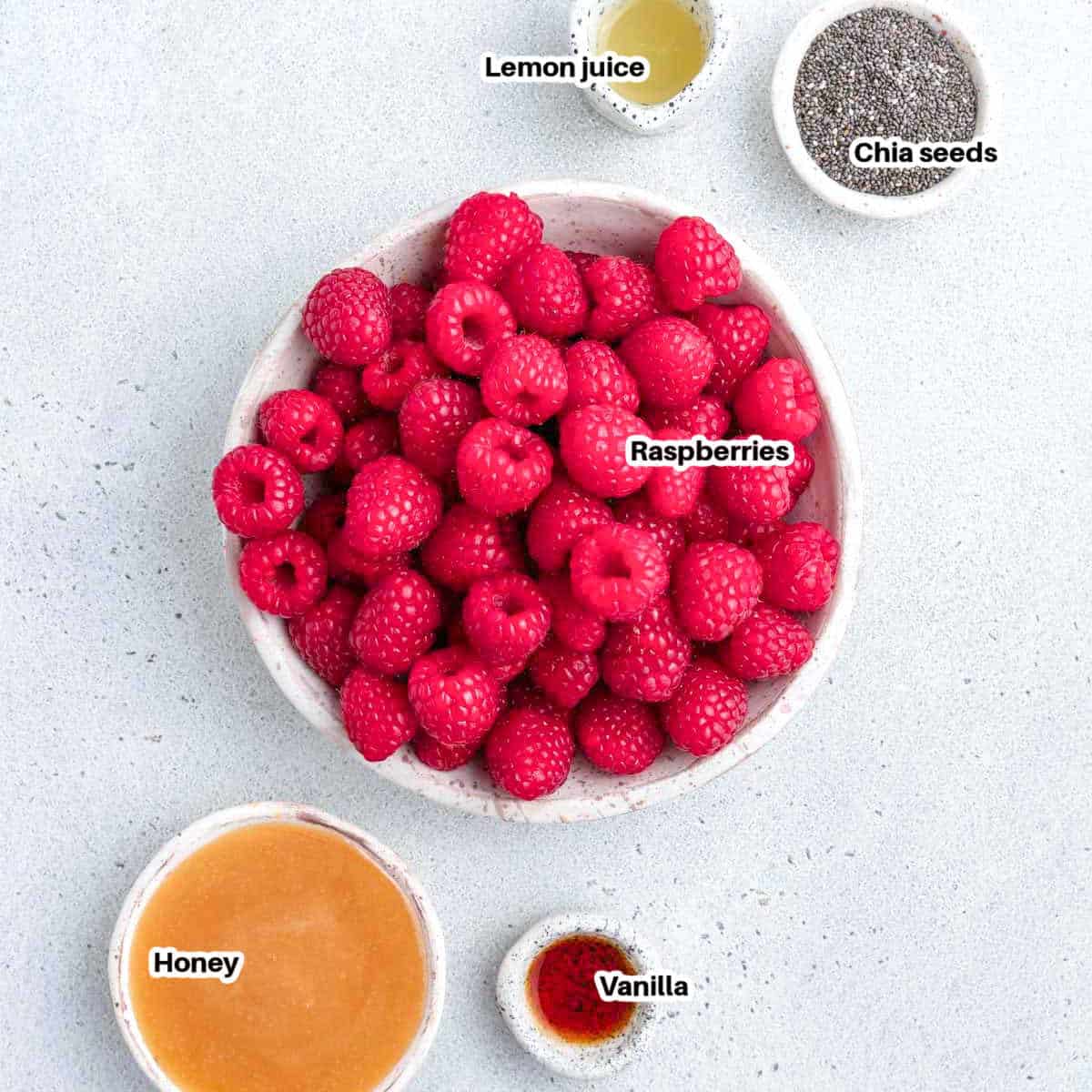 ingredients to make raspberry jam.