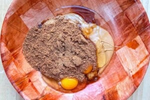 eggs, peanut butter, and sugar in a bowl.
