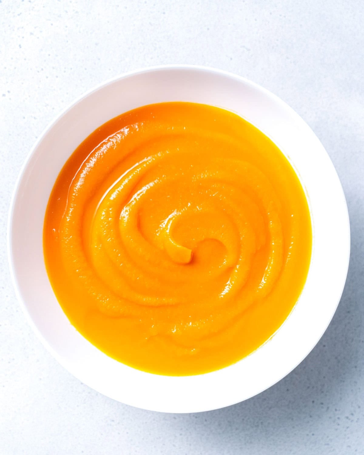 A bowl with pumpkin puree.