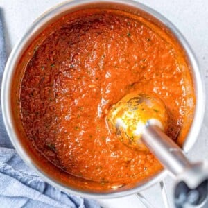 Blending the sauce in the pan.