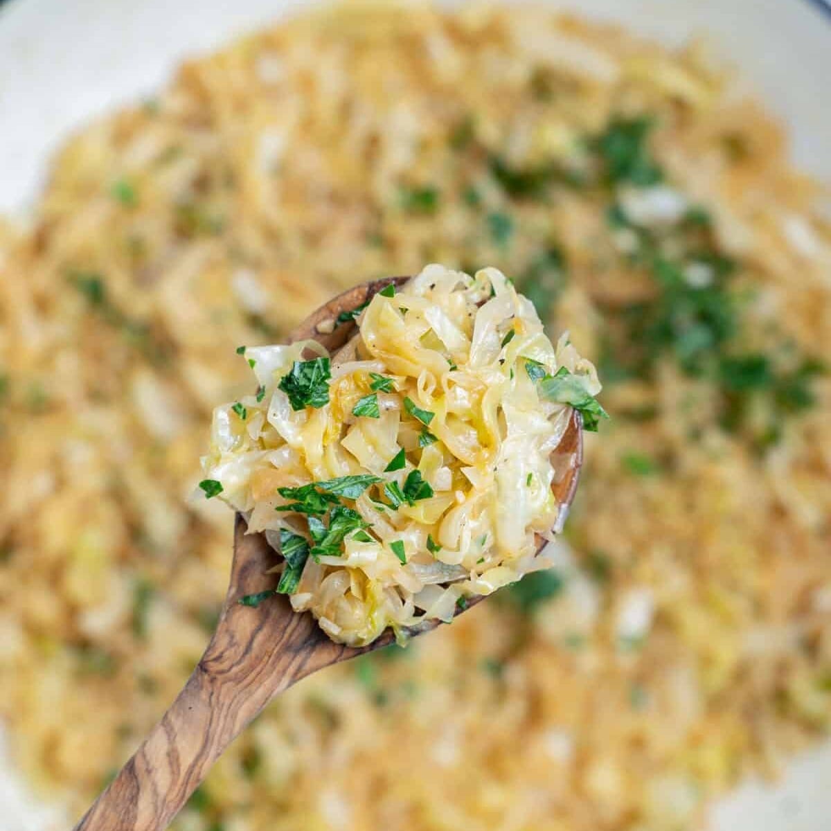 A spoonful of sautéed cabbage.