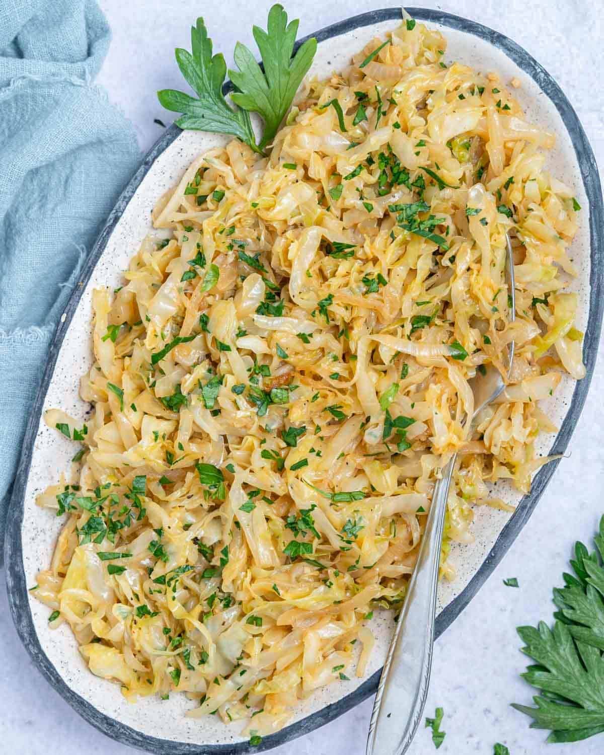 Oval-shaped dish with saut&eacute;ed cabbage.
